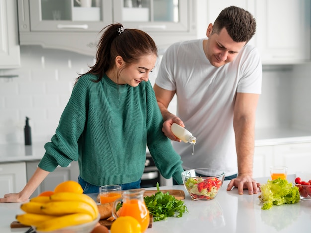 Couple cooking at home