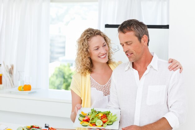 Couple cooking together in their kitchen