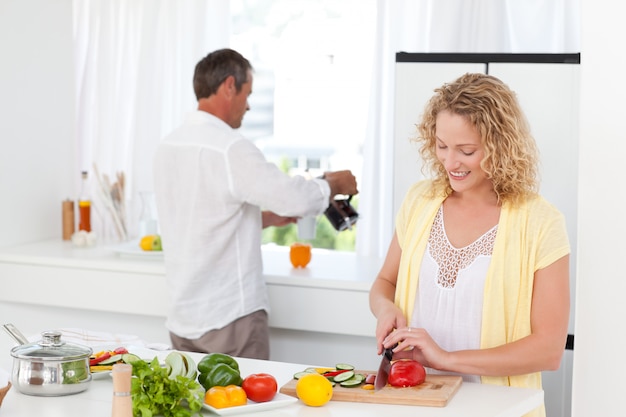 Couple cooking together in their kitchen