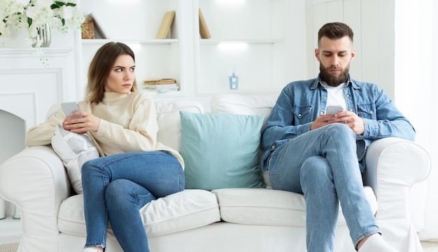 Couple Crisis Man Using Phone Not Paying Attention To Wife