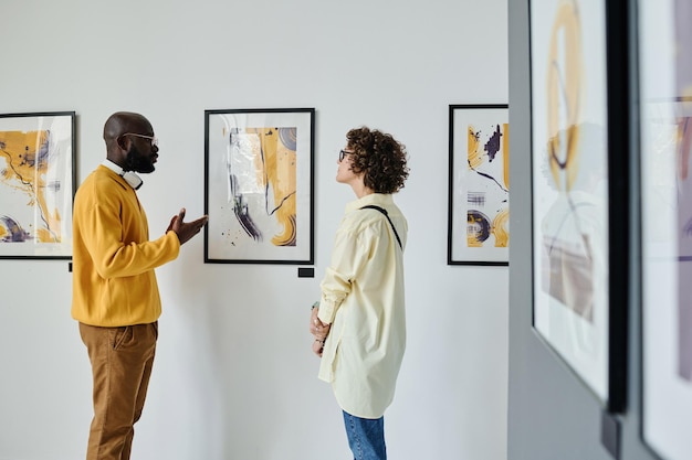 Couple discussing modern art together