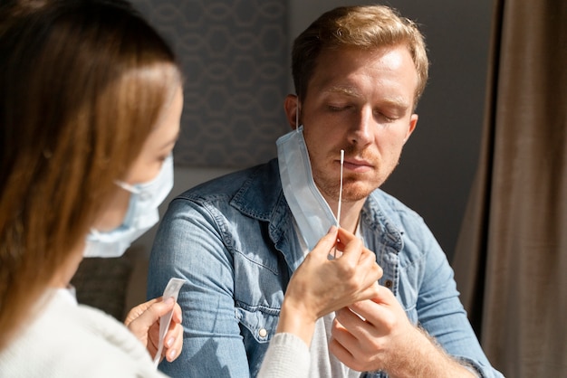 Couple doing a home covid test