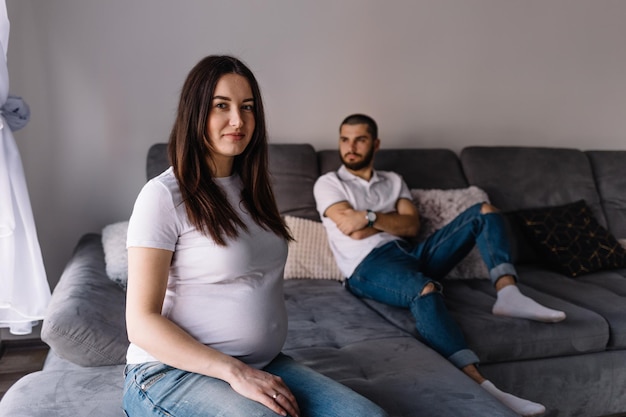 Couple dreaming to be parents Upset man comforting his depressed wife with negative pregnancy test free space