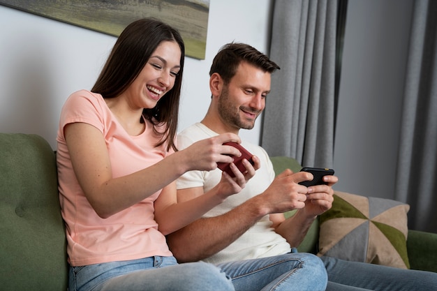 Couple enjoying playing video game