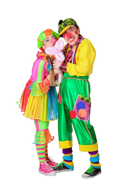 Couple of happy clowns with flowers isolated on the white background