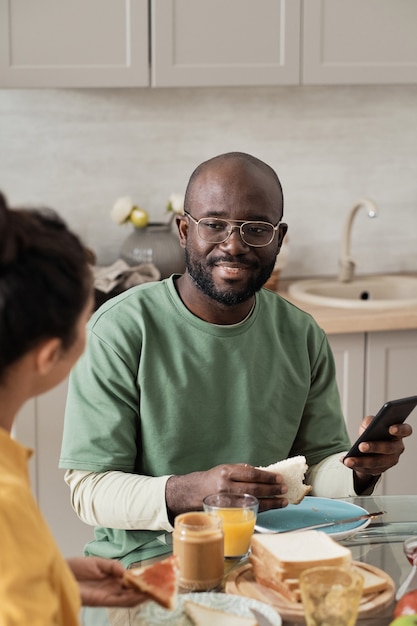 Couple having breakfast at home