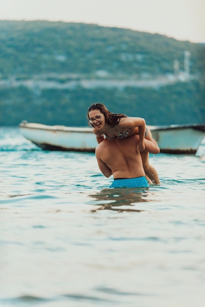 Couple having fun in the sea.High quality photo