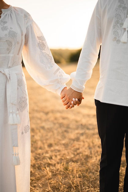 Photo couple holding hands together wedding and engagement concept