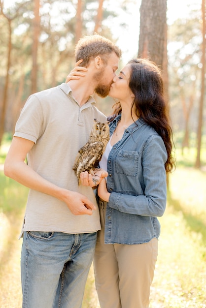 Couple hugging in the forest