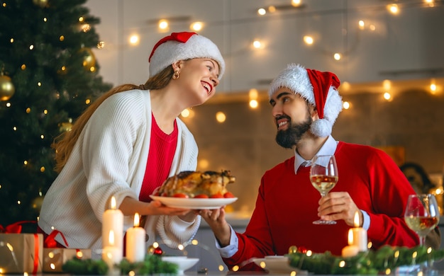 Couple is having Christmas dinner