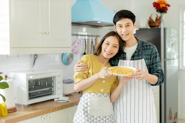 couple in love helping to cook In a romantic atmosphere