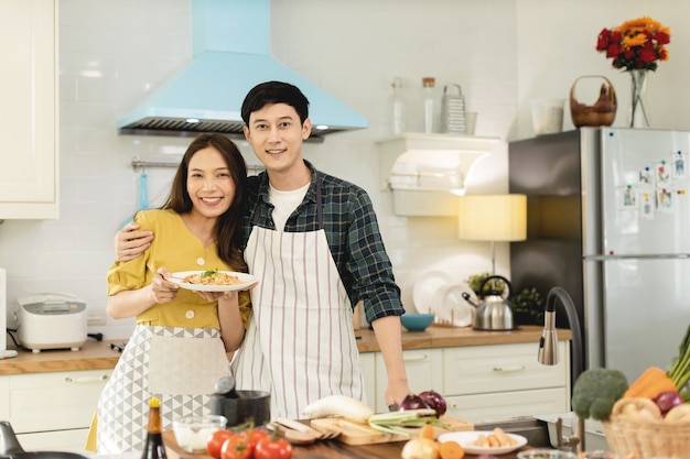 couple in love helping to cook In a romantic atmosphere