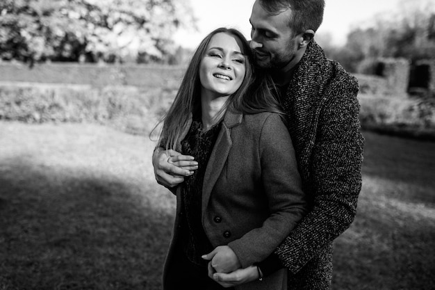 A couple in love hugging in the park