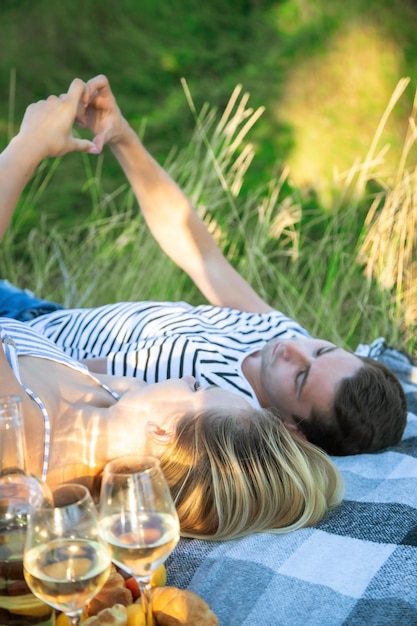 Couple in love on a picnic in the park Selective focus