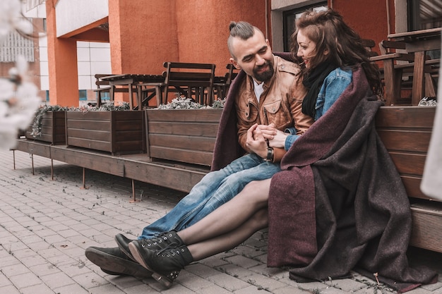 Couple in love talking, holding each other's hands . love story