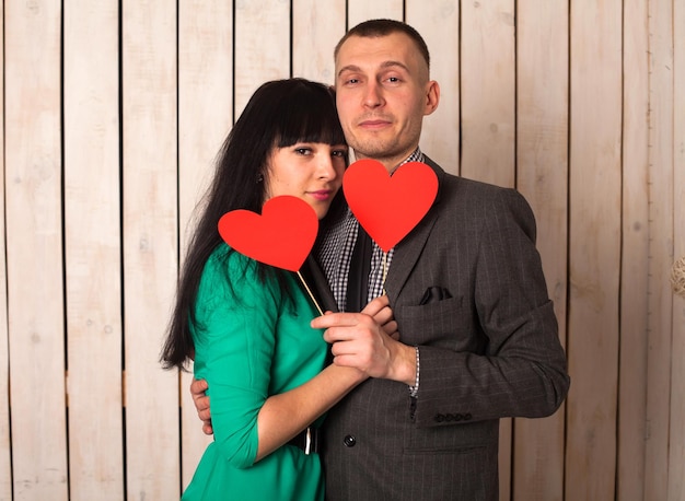 Couple of man and woman with shape of red heart. Love in Valentine's day.