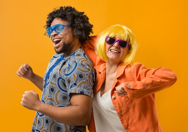 Couple at party having fun while dancing