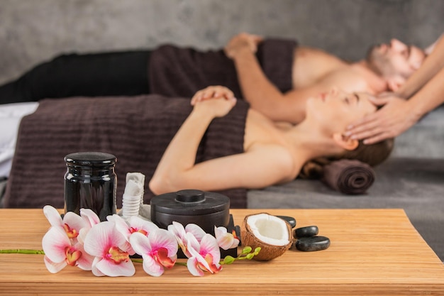 Couple relaxing together at spa centre