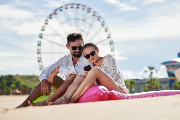 Couple Resting on Beach