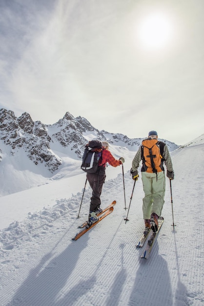 A couple of retired friends dedicate themselves to ski mountaineering