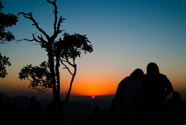 Couple silhouette at sunrise in Brazil