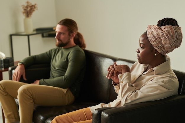 Couple sitting at psychotherapy session