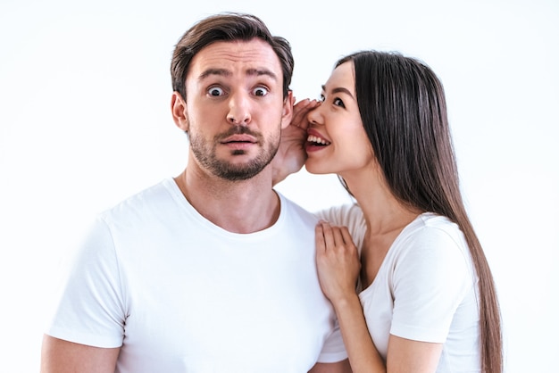 The couple standing on a white background