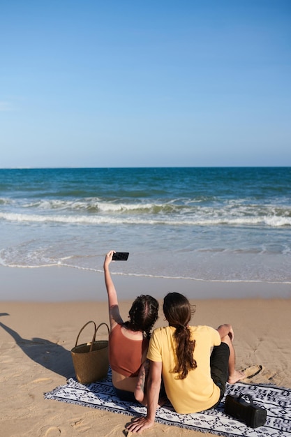 Couple Taking Selfie on Beach