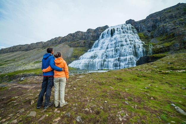 Couple of tourists and Dynjandi Iceland