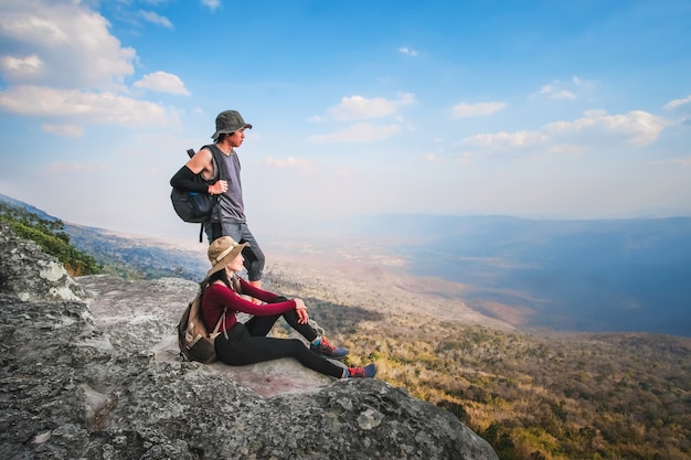 couple traveler are on top of the mountain