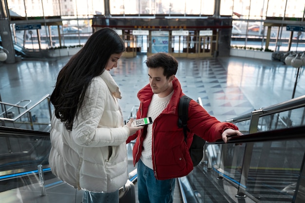 Couple traveling with vaccination passports