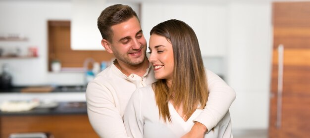 Couple in valentine day hugging in a house