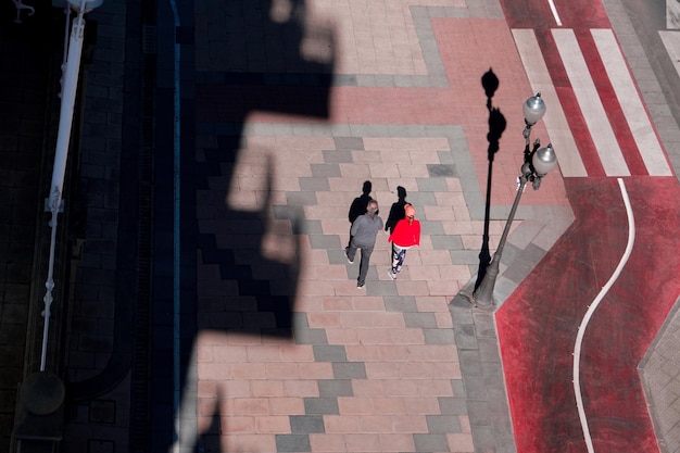 couple walking around on the street in bilbao city, basque country, spain, travel destinations