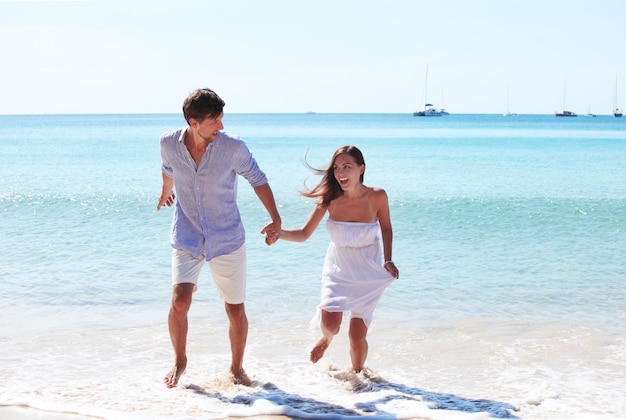 Couple walking on beach