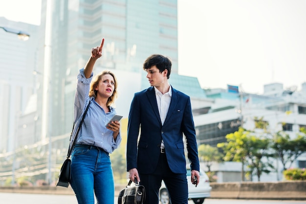 Couple walking on downtown together