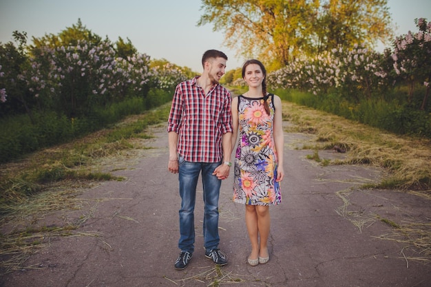 Couple walking holding hands