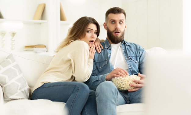 Couple Watching Horror Movie Spending Weekend At Home