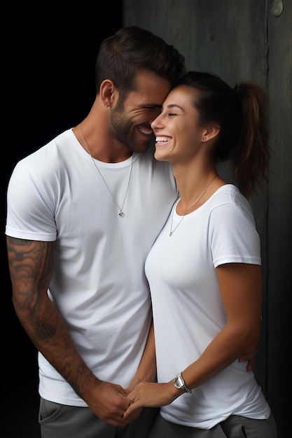 A couple wearing white t shirts and leaning towards each other