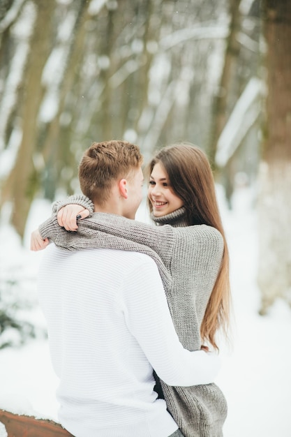 Couple in winter forest