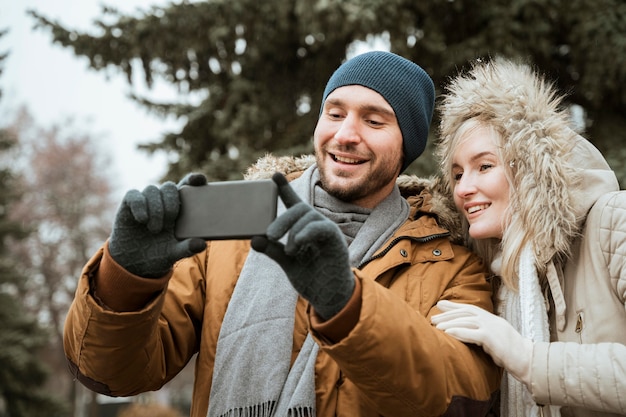 Couple in winter taking a selfie