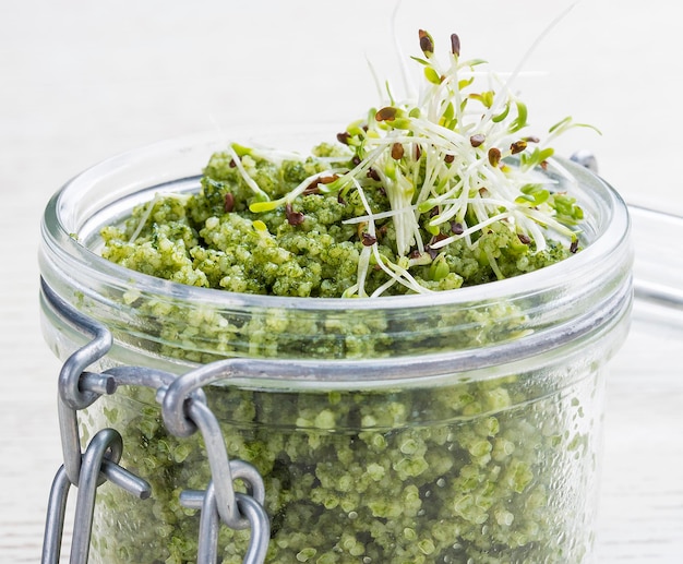 Couscous with lucerne in a glass jar