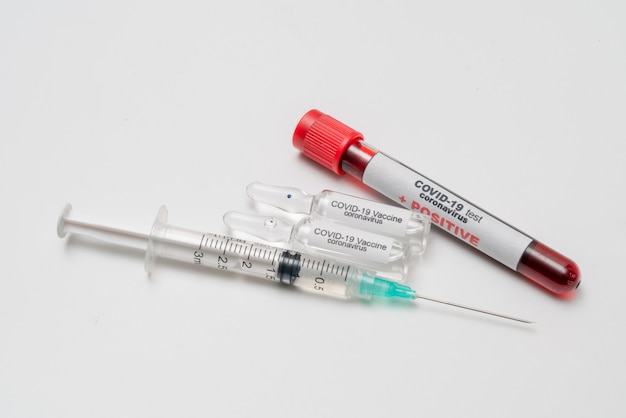 COVID 19 Coronavirus, infected blood sample in the sample tube, Vaccine and syringe injection It use for prevention, immunization and treatment from COVID-19