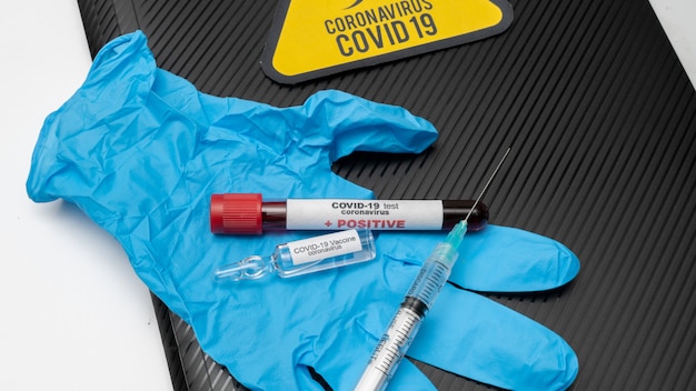 COVID 19 Coronavirus, Infected blood sample in the sample tube, Vaccine and syringe injection It use for prevention, immunization and treatment from COVID-19