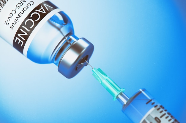 COVID-19 Vaccine Medical Ampoule. The Vaccine from the Coronovirus COVID-19 on a blue Background and a Syringe. 3D Illustration