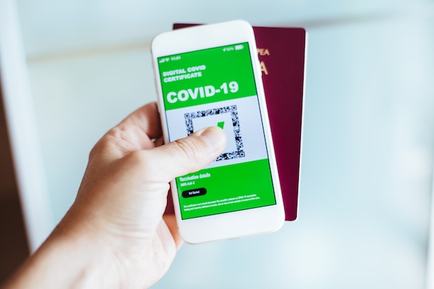 Covid digital certificate. Health digital passport app on mobile phone