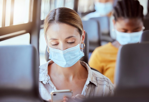 Covid travel and woman with mask on bus with phone with social media communication or networking on transport Girl digital or mobile app for safety compliance health or 5g network or smartphone