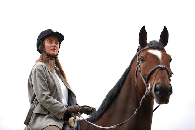 Cowgirl in a cowboy hat rides a horse on the background of the forest Motion blur effect