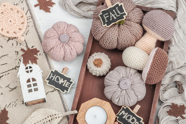 Photo cozy autumn mood composition handmade decor for home traditional fall symbols knitted props