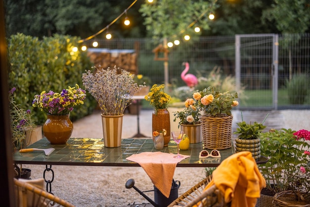 Cozy backyard with flowers at dusk