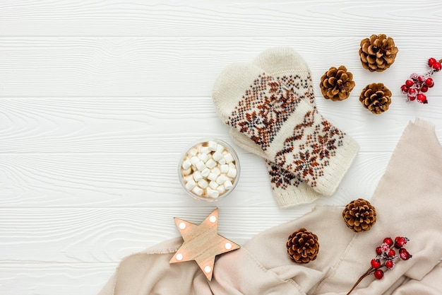 Cozy christmas evening with cocoa flat lay white wooden